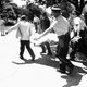 One of the gunman’s victims is carried across the campus to a waiting ambulance in Austin on August 1, 1966. Photo via AP.